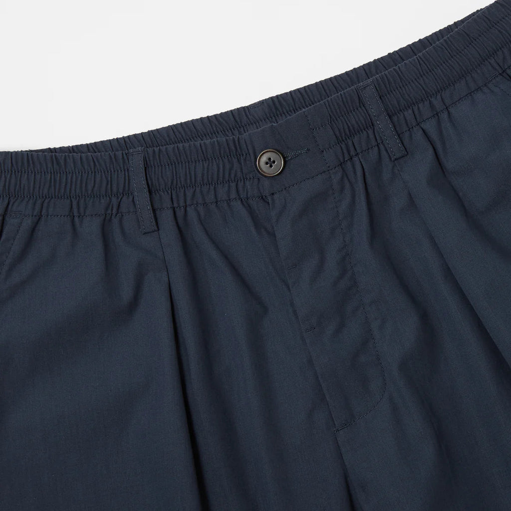 UNIVERSAL WORKS Recycled Polytech Pleated Track Pant | Navy