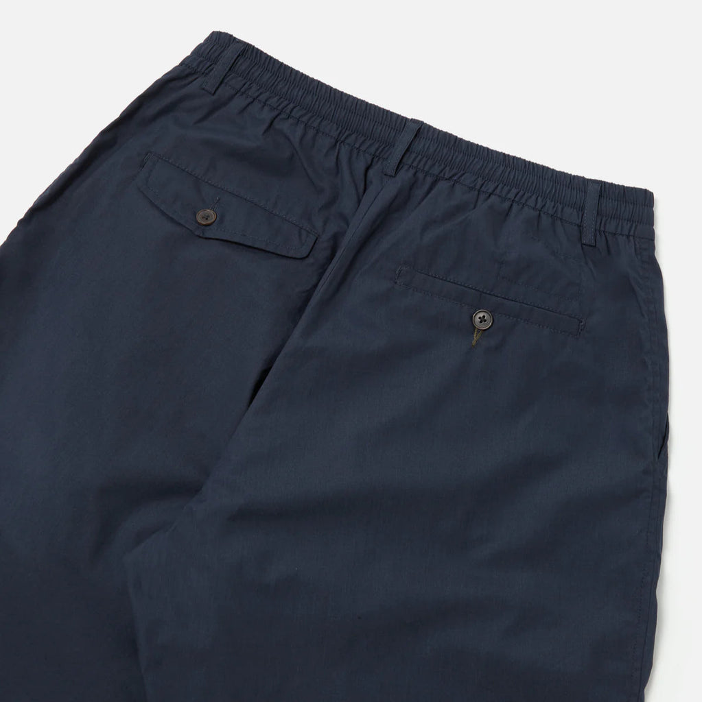 UNIVERSAL WORKS Recycled Polytech Pleated Track Pant | Navy