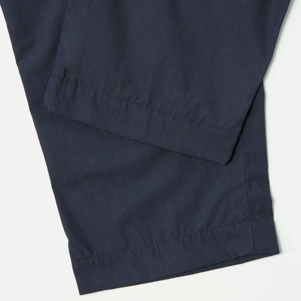 UNIVERSAL WORKS Recycled Polytech Pleated Track Pant | Navy